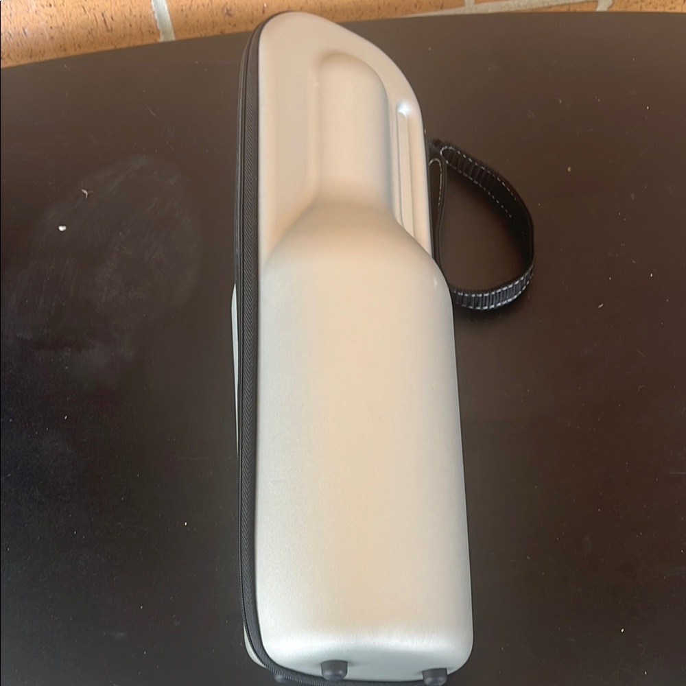 Rabbit wine holder and cooler. Sleek Silver Hard Shell Case. Great for outdoors!